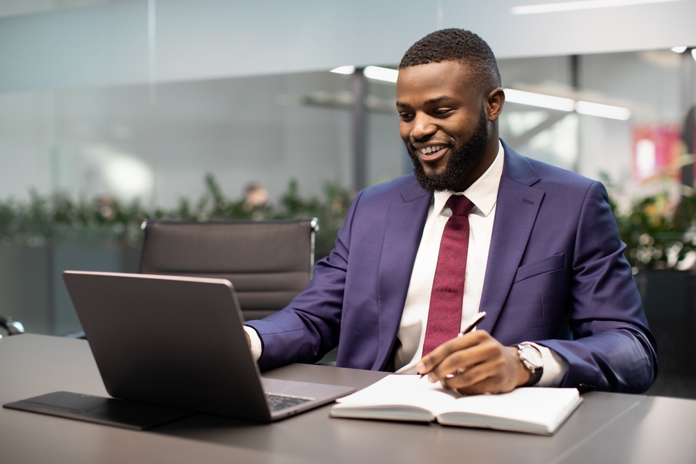 Happy,Handsome,Young,Black,Businessman,Working,At,Office,,Sitting,At Happy,Handsome,Young,Black,Businessman,Working,At,Office,,Sitting,At
